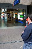 Looking at and using hand controller to find front entrance to central library.